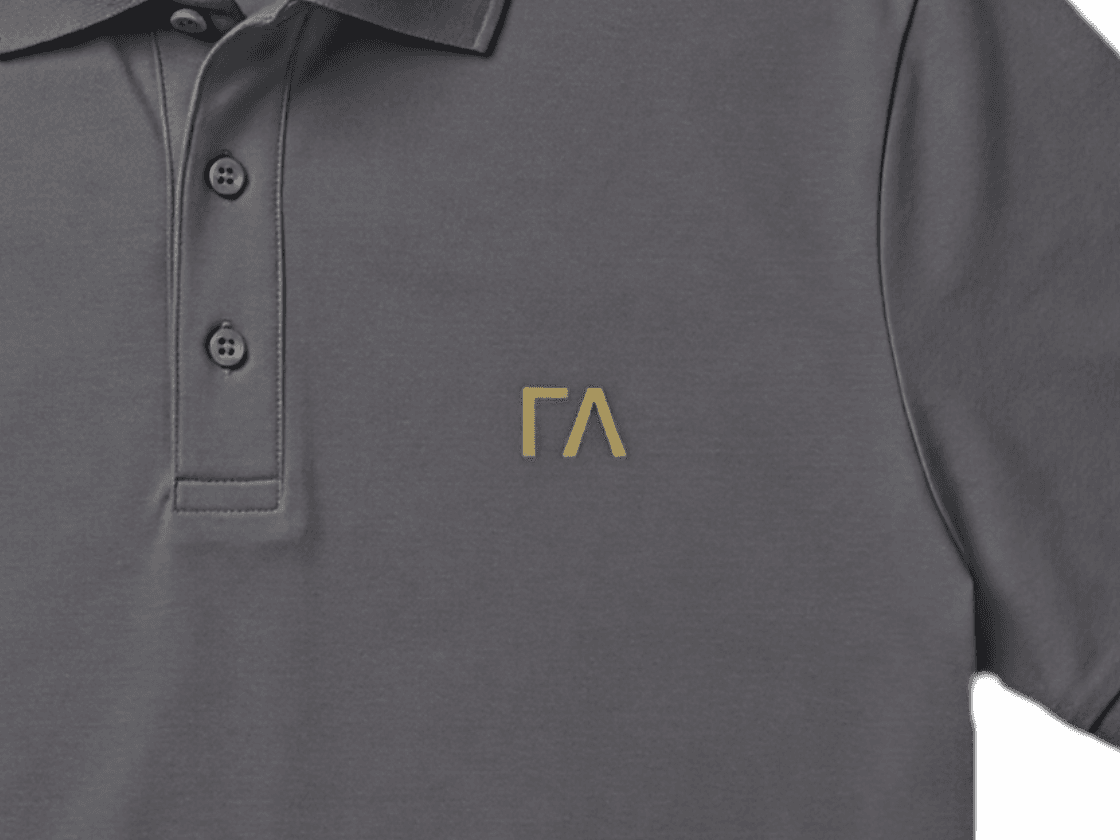 Close-up of the gold ΓΛ embroidery on the left chest